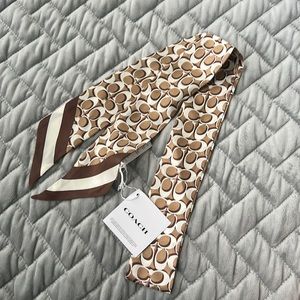 Brand new Coach silk twilly scarf in signature “C” pattern.